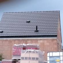 Construction de 31 logements en tuiles terre cuite, ardoise, brune et nuagé